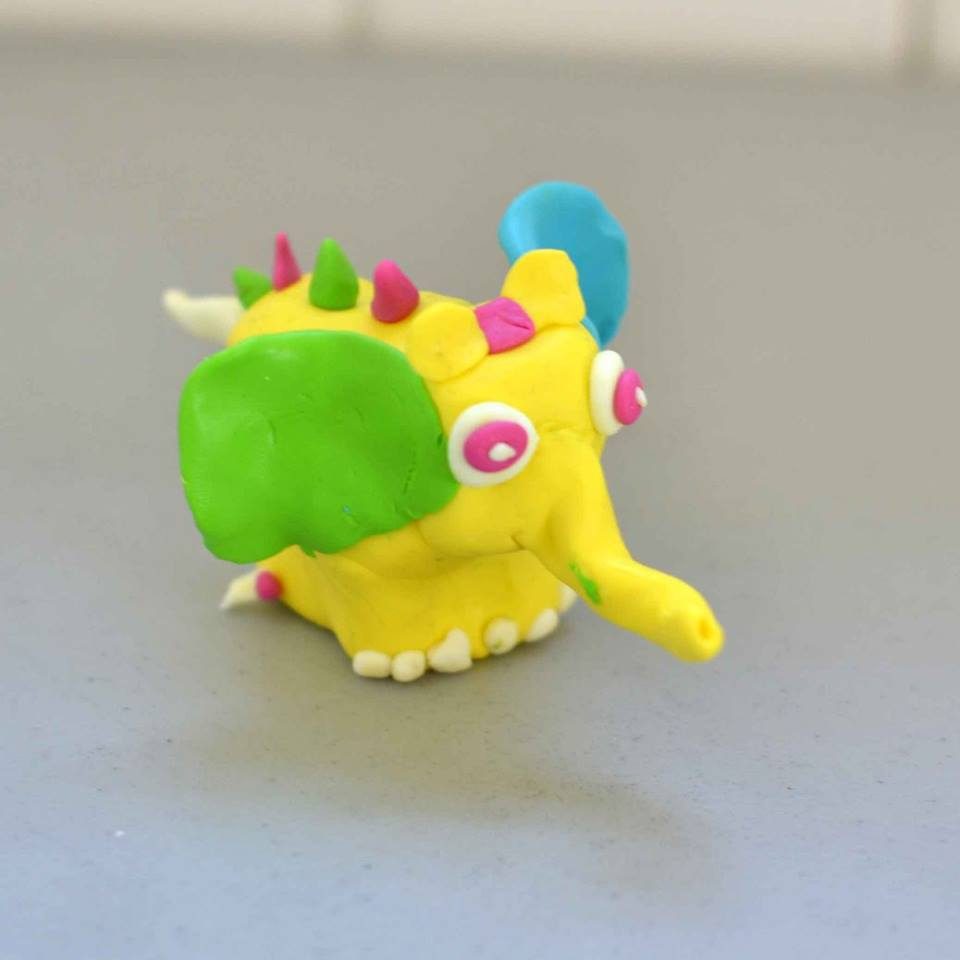 Yellow and green clay dragon